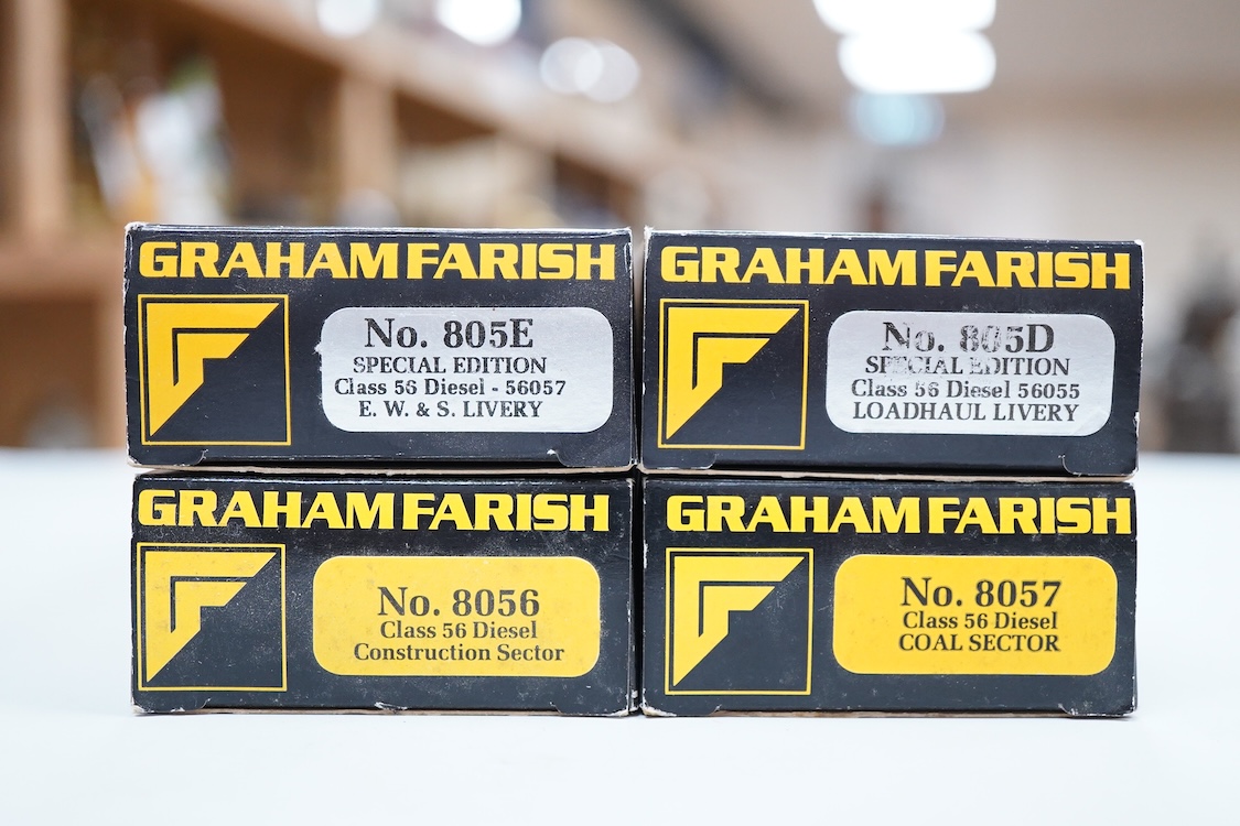 Four boxed Graham Farish N gauge railway class 56 diesel locomotives; a Load Haul, 56055, (805D), an EWS, British Fuels 56057 (805E), a Coal Sector, 56 092, (8057) and a Construction Sector, 56 059 (8056).